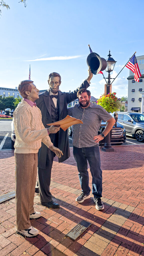 Alex with a President Lincoln statue in Downtown Gettysburg, Pennsylvania.