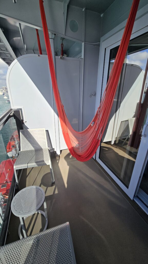 Virgin Voyages Scarlet Lady Cruise Ship Sea Terrace Room on the terrace with the hammock