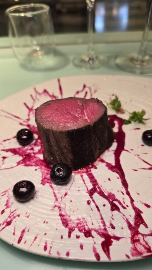 Venison Tenderloin at Test Kitchen on the Virgin Voyages Scarlet Lady Cruise Ship.