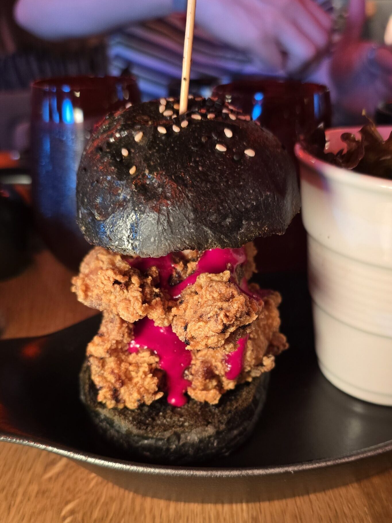 fried chicken sandwich served at Razzle Dazzle on Virgin Voyages Scarlet Lady cruise ship