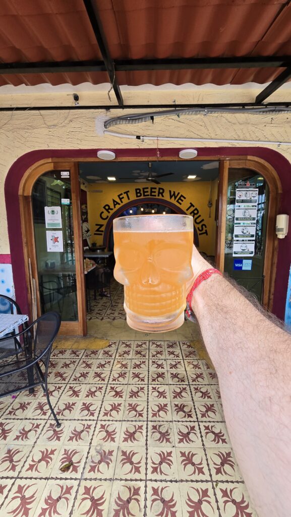 A beer at the entrance of KUSAM Brewery and Tacos in Cozumel Mexico