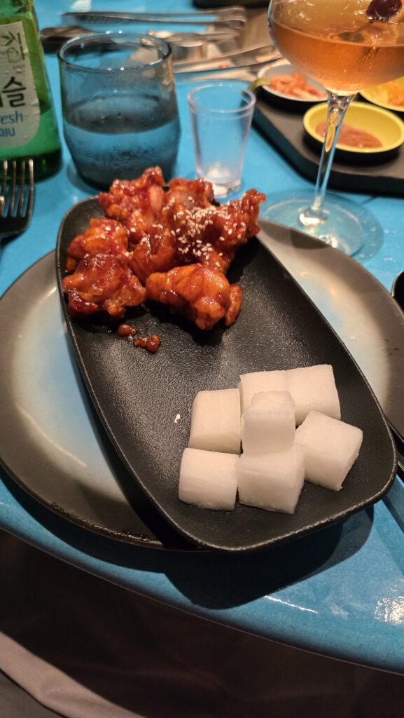 crispy chicken in sweet chili sauce served at Gunbae on Virgin Voyages Scarlet Lady cruise ship