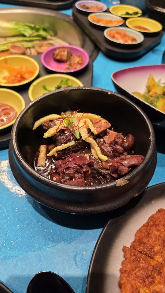 braised short ribs served at Gunbae on Virgin Voyages Scarlet Lady cruise ship