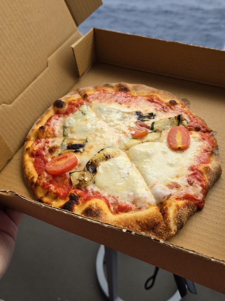 pizza from The Pizza Place on Virgin Voyages Scarlet Lady cruise ship