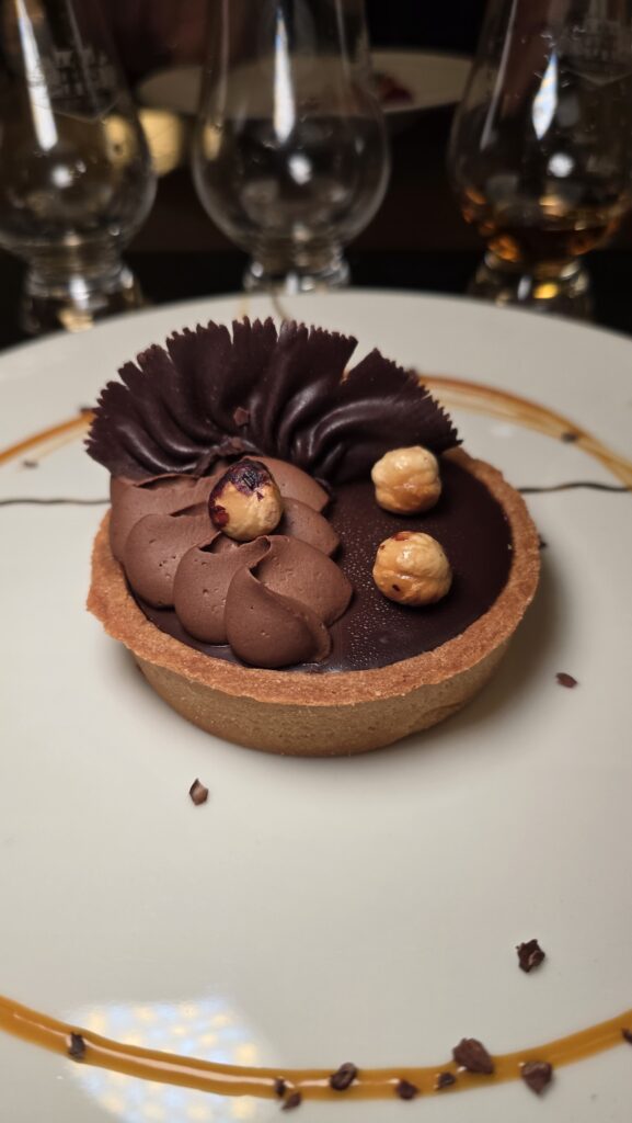 chocolate torte dessert served at The Wake on Virgin Voyages Scarlet Lady cruise ship