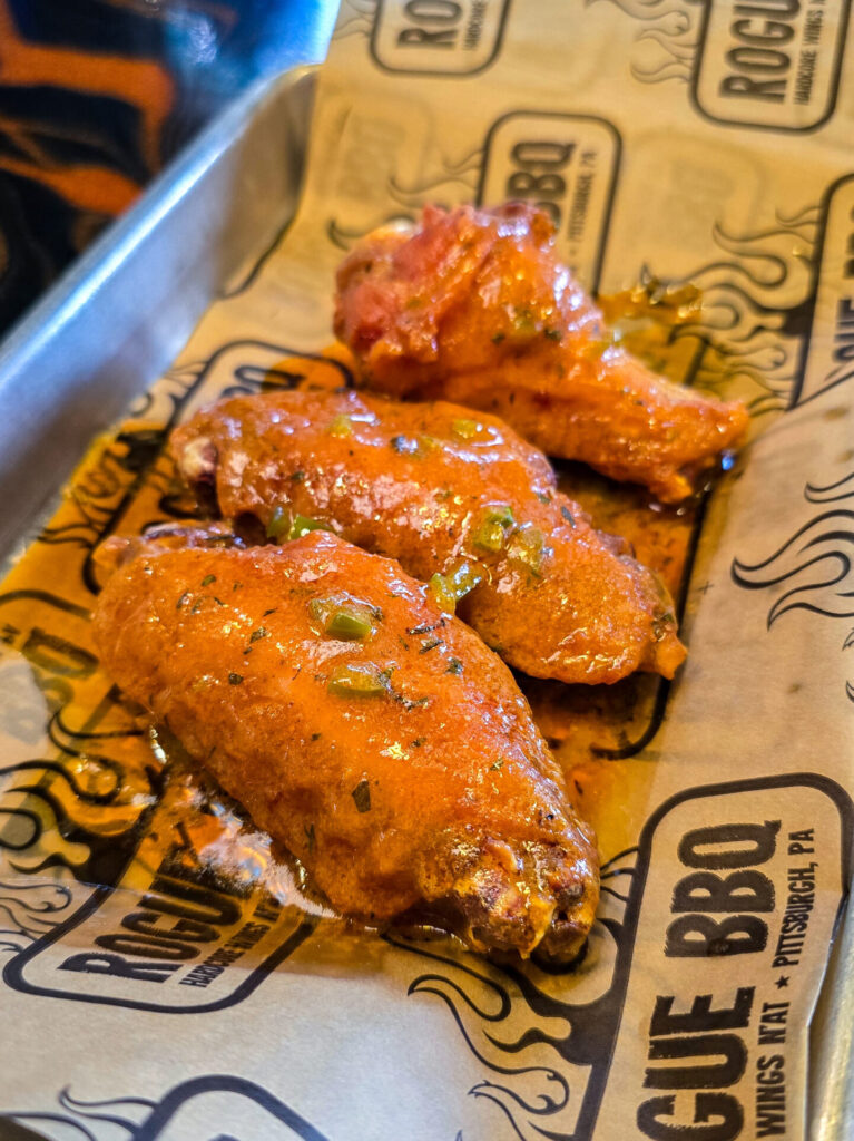 fried chicken wings covered in cowboy butter sauce